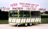 14′ Concession  Trailer with Tall Roof Marquee, Plexi Awning Marquee, Glass Windows, Metal Wheel Skirts and Custom Lettering and Graphics - Thumbnail